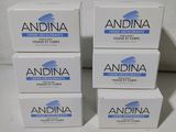 quatre boîtes de crème Andina empilées les unes sur les autres