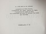 an open book with the title of a poem written in french