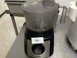 a blender sitting on top of a table in a kitchen