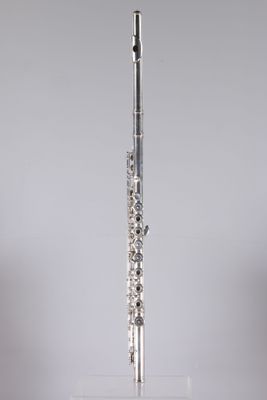 a flute that is sitting on top of a stand