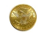 an image of a gold coin on a white background