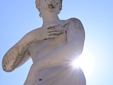 a statue of a man holding a baby in his arms
