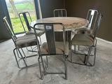 a table and chairs in a room with a glass door