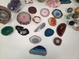 a lot of different types of stones on the table