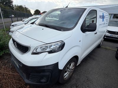a white van that is parked in a parking lot