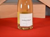 a bottle of wine that is sitting on a table