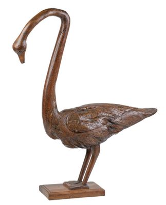 Sculpture représentant un cygne crée dans un tronc brut, non…