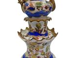 a vase that has a blue and white design on it