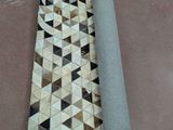 an image of a piece of tile laying on the floor