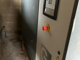 a machine that is sitting inside of a building