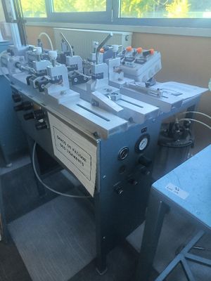 an image of a machine that is working on a piece of paper