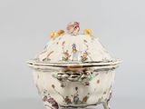 an image of a white and gold covered dish on a stand