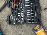 many tools that are laying out on the ground