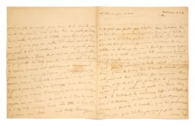 lettre manuscrite écrite à l'encre noire sur une feuille de papier