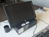 a desktop computer sitting on a desk with a keyboard and mouse