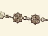 silver plated bracelet with two charms on a chain