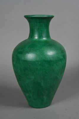 pair of green vases on a grey background