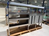 a metal shelf that has many drawers on it