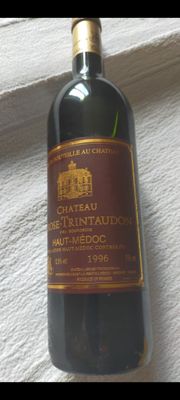 a bottle of wine that is sitting on a table
