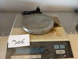 an image of a scale with a price tag on it