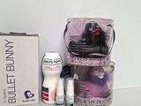a box of toiletries and a bottle of lotion sitting on a table