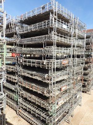 a large pile of scaffolding in the middle of a construction site