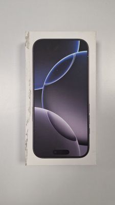 une image représentant une boîte contenant un téléphone, posée sur une surface blanche