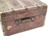 an old suitcase that is sitting on a table