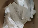 a cardboard box with a bunch of white tissue in it
