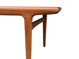 a close up of a wooden table on a white background