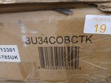 a box with a barcode on it sitting on the floor