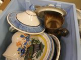 a blue box filled with different types of pottery