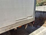 a white truck that is parked on the side of the road