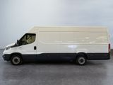 a picture of a white van parked in a parking lot