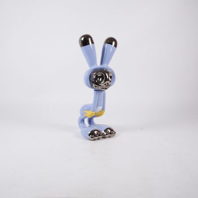 a small toy that is sitting on a white surface