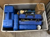 a blue tool box with tools inside of it