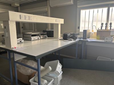 a lab with a lot of counter space and a lot of trash