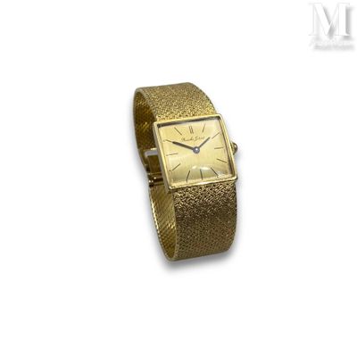 an image of a gold wrist watch on a white background
