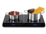 une photo montrant deux casseroles de pâtes en train de cuire sur une cuisinière