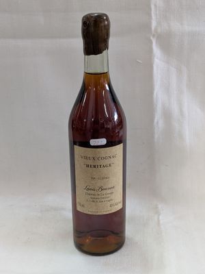 a bottle of wine that is sitting on a table
