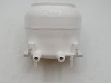 a close up of a white plastic container on a white surface