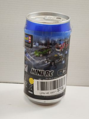 a can of beer that is sitting on a table