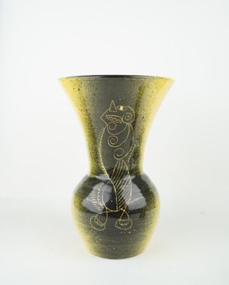 a black and yellow vase with a cat design on it