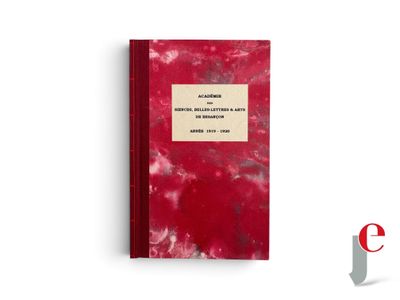 an image of a red book sitting on top of a white surface