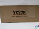 a box that is sitting on a table with a white wall in the background