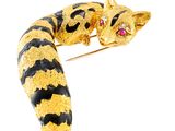 broche en forme de chat en émail jaune et noir, avec des yeux et une queue roses
