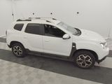 a picture of a white suv parked in a garage