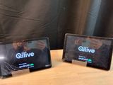 two tablet computers that are sitting on a table