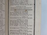 an open book with a black and white title on it