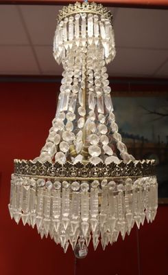 Lustre en métal et laiton doré à décor de pendeloques en cri…